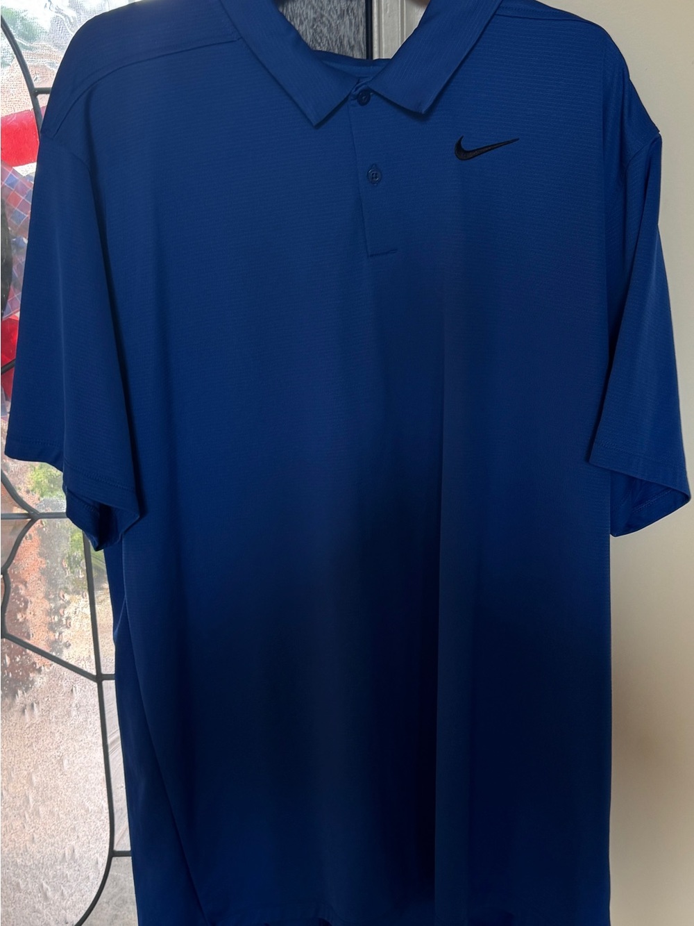 Nike Men's Royal Blue Polo with Black Swoosh